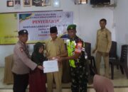 Bhabinkamtibmas Polsek Donggo Laksanakan Pengamanan Penyaluran BLT DD di Desa Mbawa