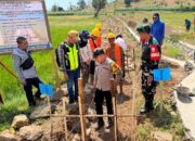 Hadiri Peletakan Batu Pertama P3-TGAI, Bhabinkamtibmas Polsek Woha Imbau Warga Jaga Kondusifitas Kamtibmas