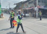 Polsek Gangga Gelar Kegiatan “Rawan Siang” di Jalan Raya Gangga – Bayan
