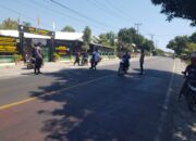 Siagakan Personel di Jalan Raya, Polsek Gangga Laksanakan Pos Rawan Siang demi Kelancaran Lalu Lintas